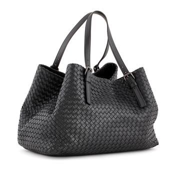 BOTTEGA VENETA, a black woven leather tote bag.