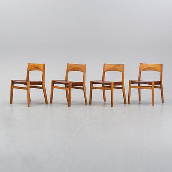 Four oak chairs with leather seat by John Vedel Rieper, Denmark, 1962.
