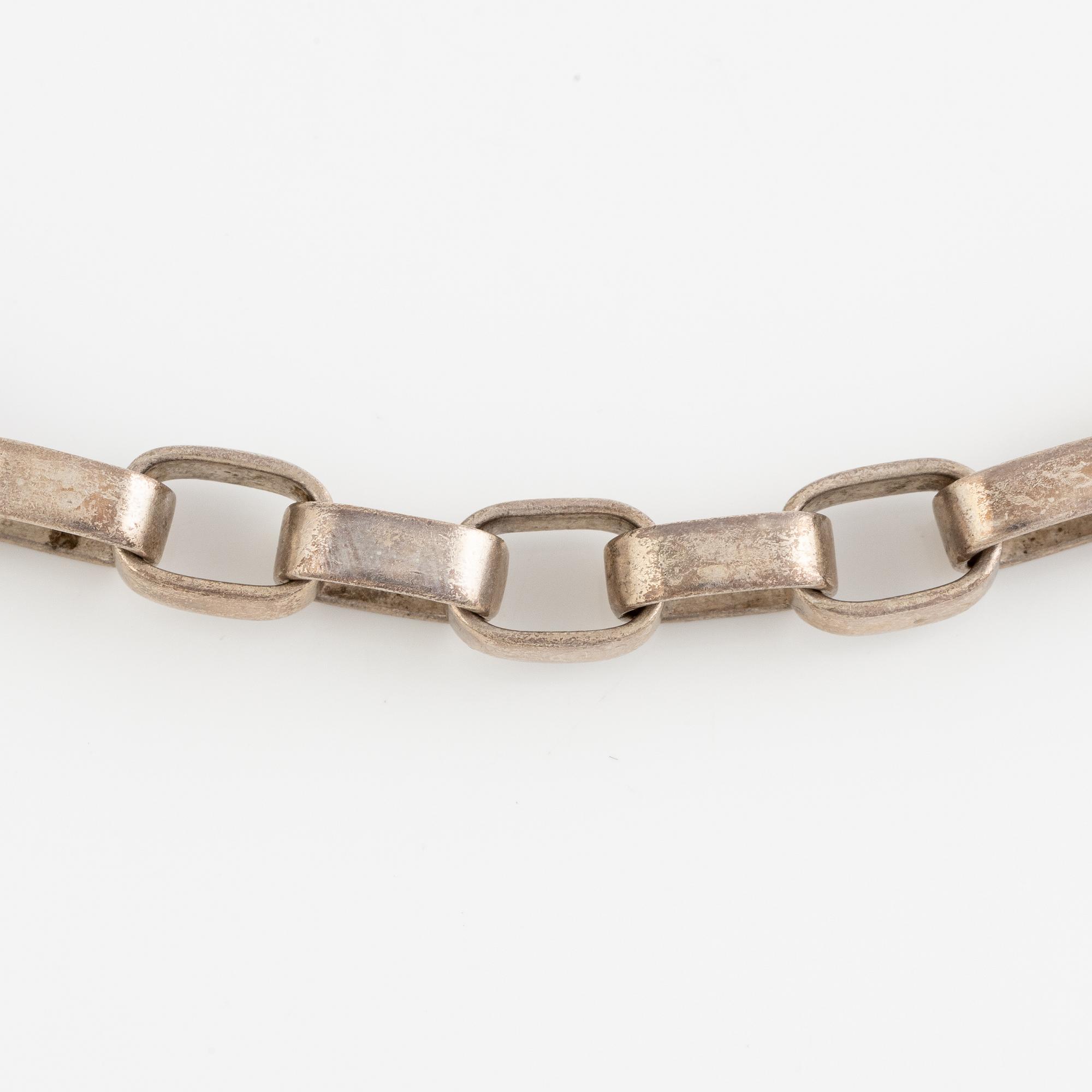 Sven-Erik Högberg, arm bracelet and collar, silver.