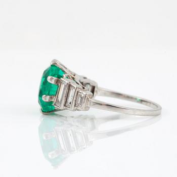 A cushion-shape mixed cut Colombian emerald, 4.56 cts, and baguette-cut diamond ring.
