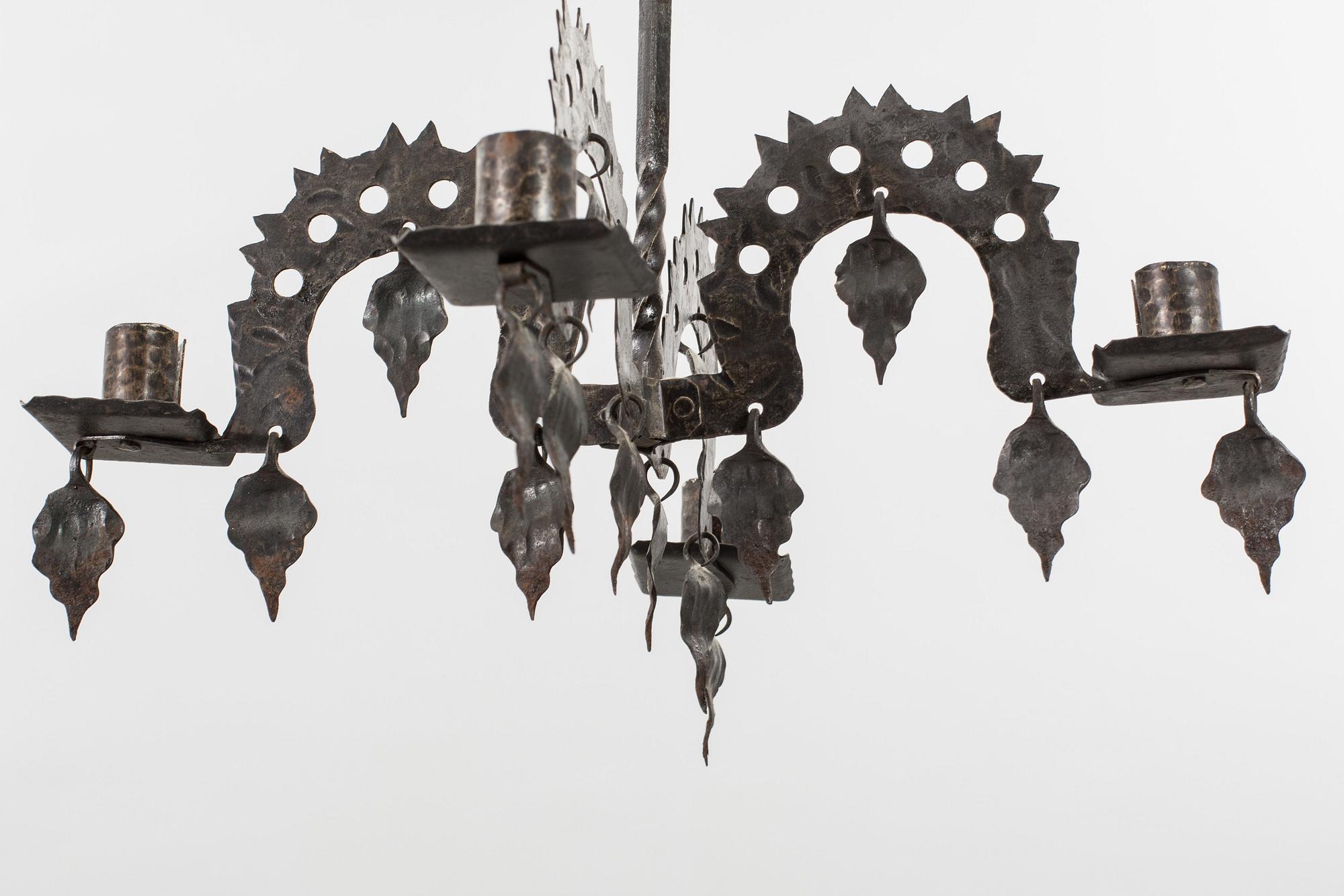 A FOLKLORE LAMP 20TH CENTURY.