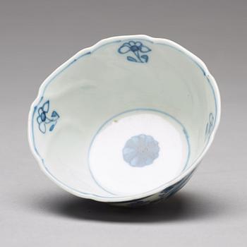 A set of three blue and white cups with stands, Qing dynasty, Kangxi (1662-1722).