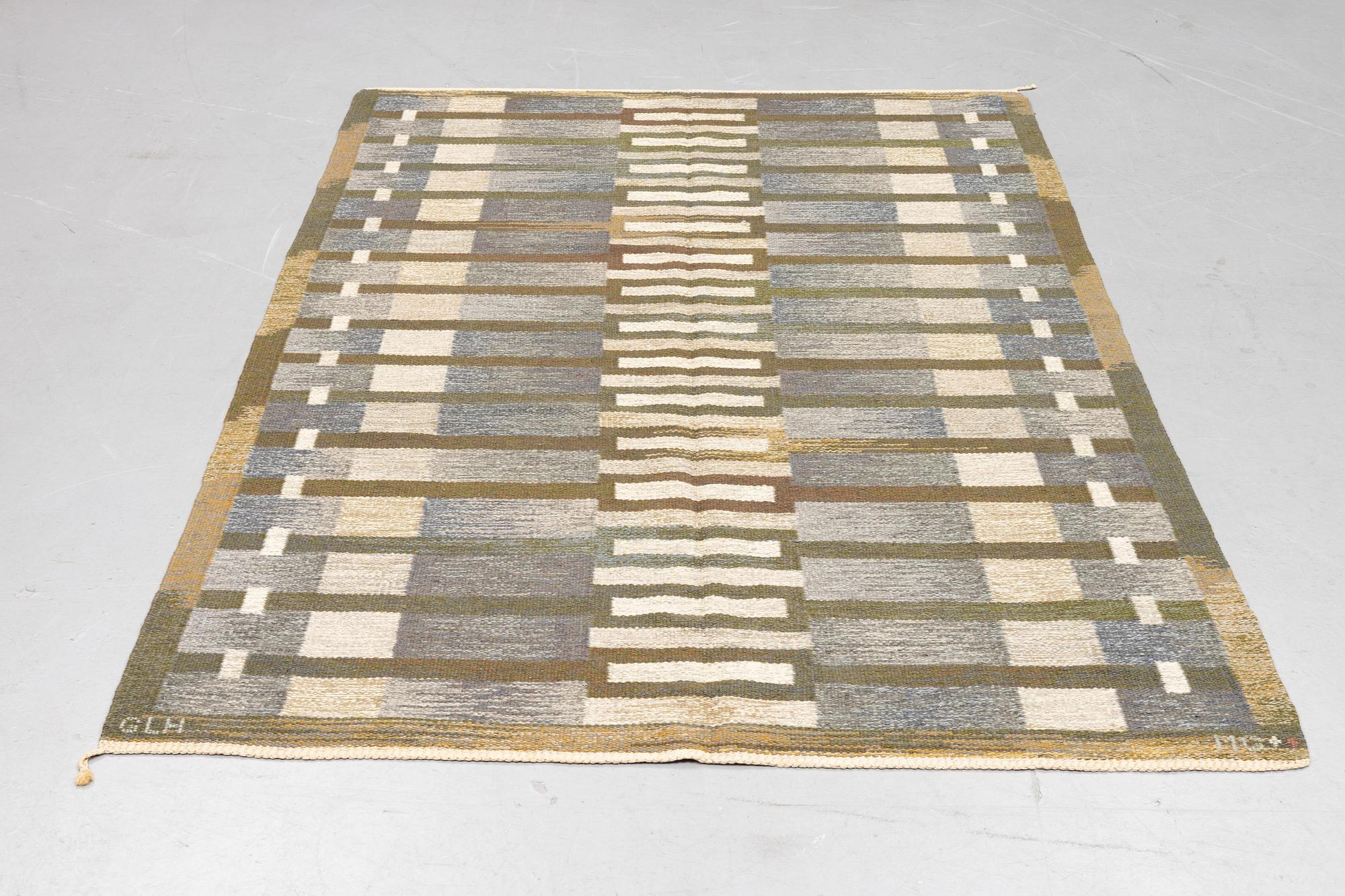 Margareta Grandin-Nettles, a carpet, flat weave, ca 249 x 167 cm, signed GLH MG.