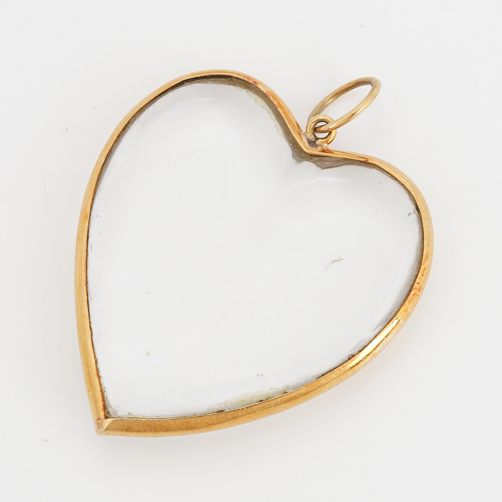 HÄNGE, hjärta med bergkristall med guldram.