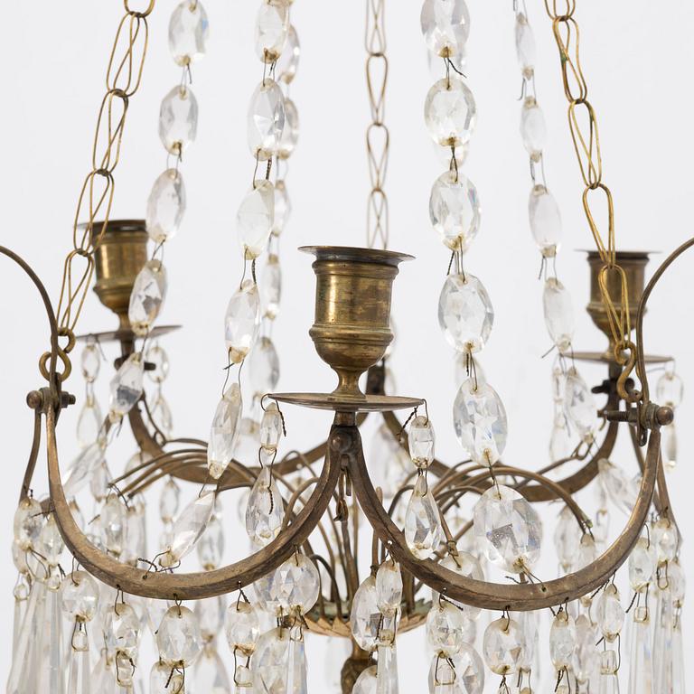 A Gustavian three-light chandelier, Stockholm, late 18th century.