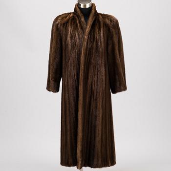 A Long Brown Mink Coat by Grosvenor to Harrods.