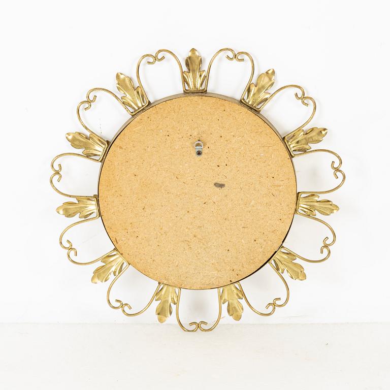 A brass mirror, second half of the 20th Century.