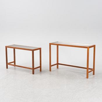 A model 548 set of two mahogany side tables with steel trays by Josef Frank for Firma Svenskt Tenn, designed 1934.