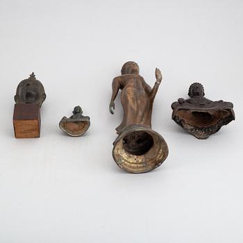 A group of four Thai buddha sculptures, 20th Century.