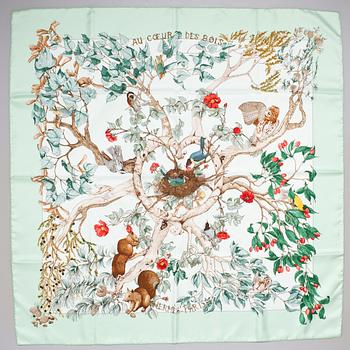 65. A Hermès silk scarf "Au Coeur des Bois".