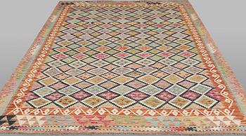 A Kilim rug, approx. 297 x 198 cm.