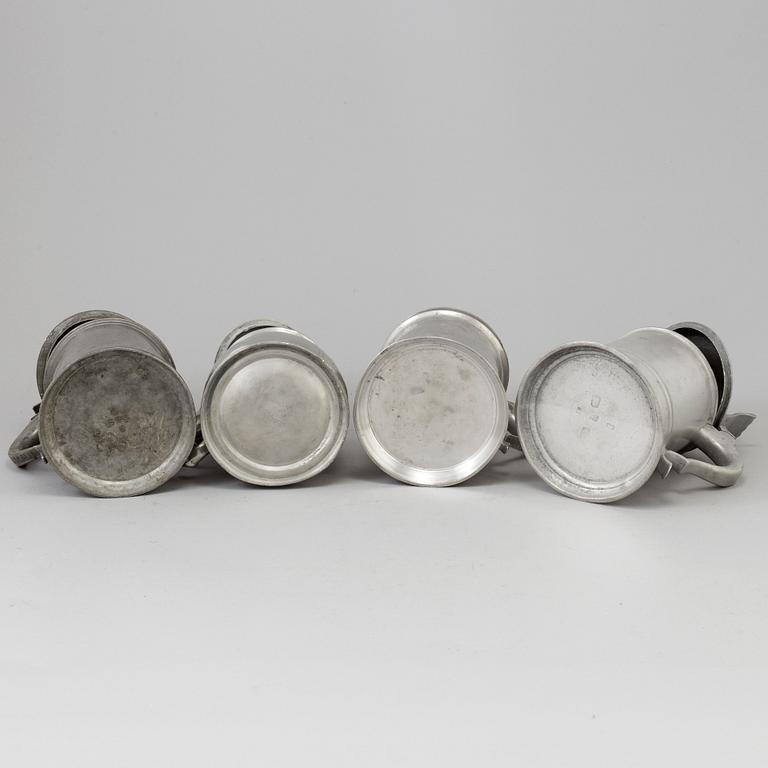 Four Swedish pewter tankards, 19th century.