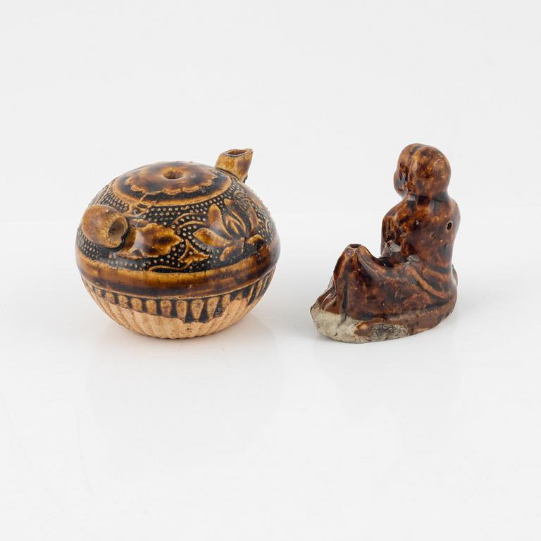 A brown glazed water dropper and a brush rest, Qing dynasty, 19th Century.