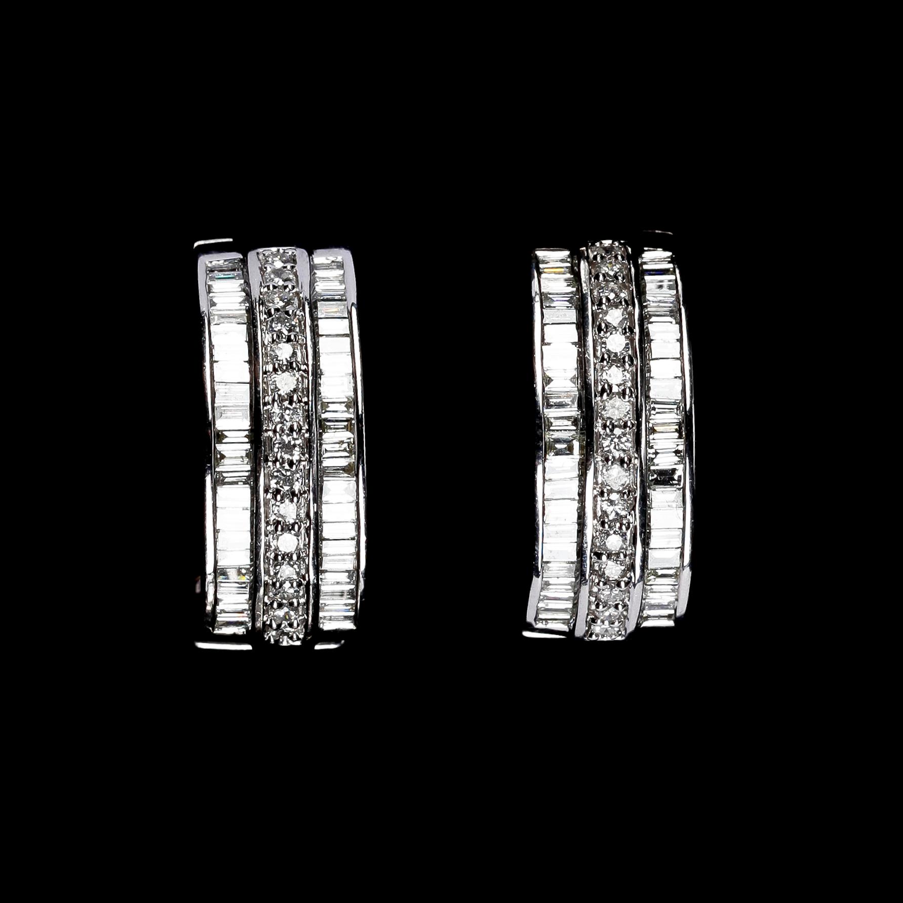 EARRINGS, brilliant and baguette cut diamonds, tot. app. 2 cts.