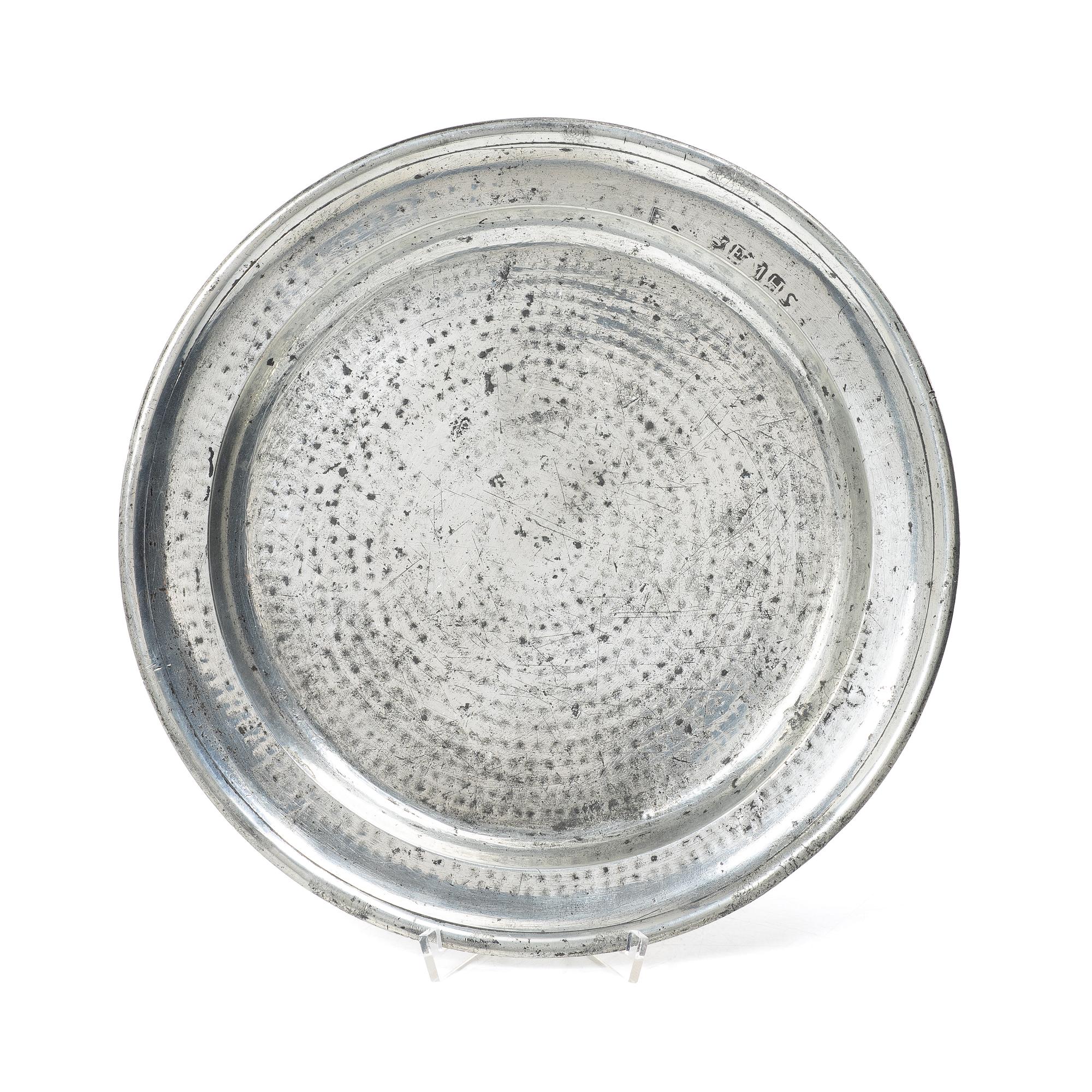 A silvered pewter charger by E. M. Hammarstrand, Falun 1776.