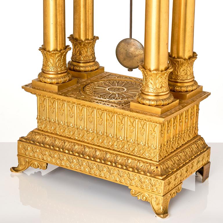 An Empire ormolu portico mantel clock for the Turkish market, first part of the 19th century.