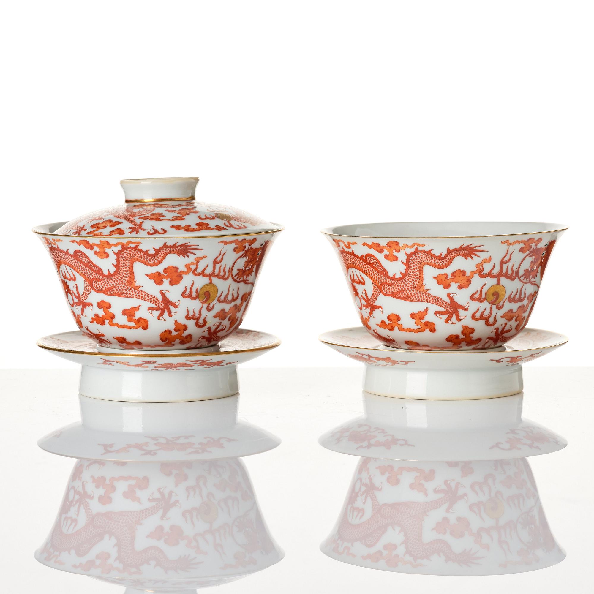 A pair of five clawed dragon bowls on stands and a cover, Qing dynasty, Daoguang mark and period (1821-50).