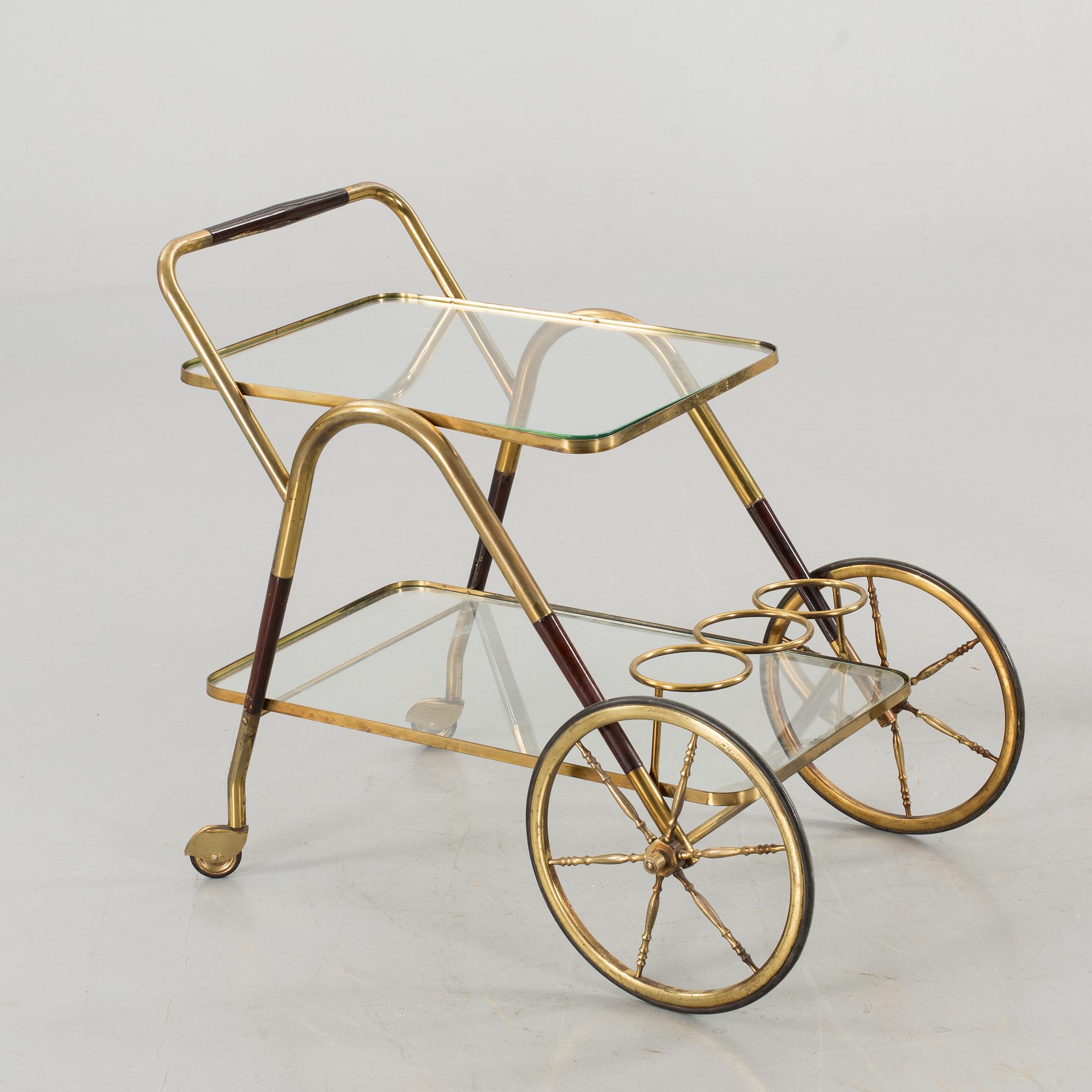 A BRASS SERVING TROLLEY, second half of the 20th century.