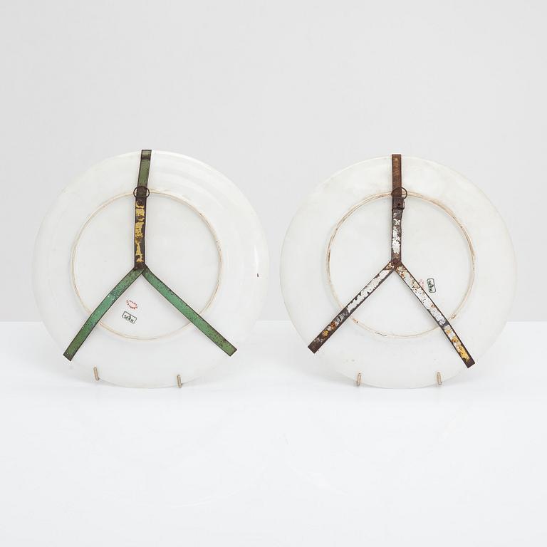 A pair of porcelain plates for Hache & Co, France.