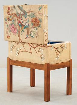 A hand painted casket on a walnut stand attributed to Estrid Ericson, Svenskt Tenn, Sweden 1950's.