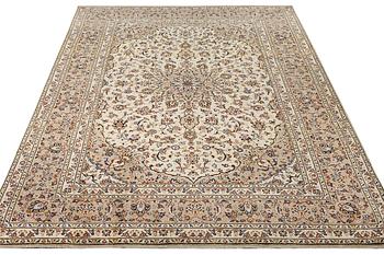 A Keshan carpet, c. 355 x 240 cm.