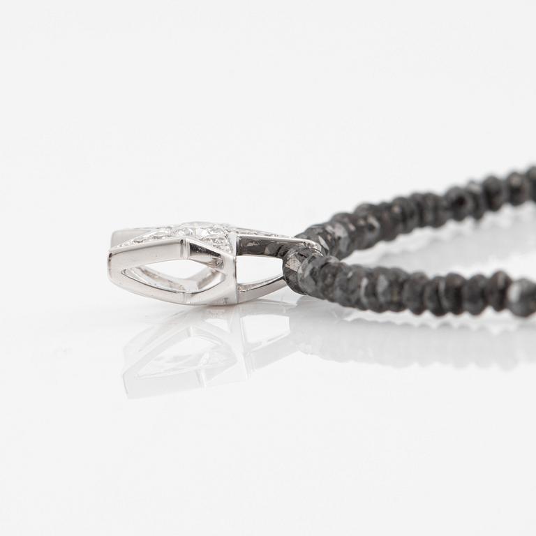 Necklace, Atelier Ajour, black diamonds with a star pendant set with brilliant-cut diamonds.