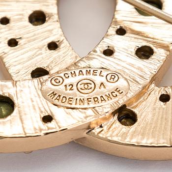 Chanel, brosch och hänge.