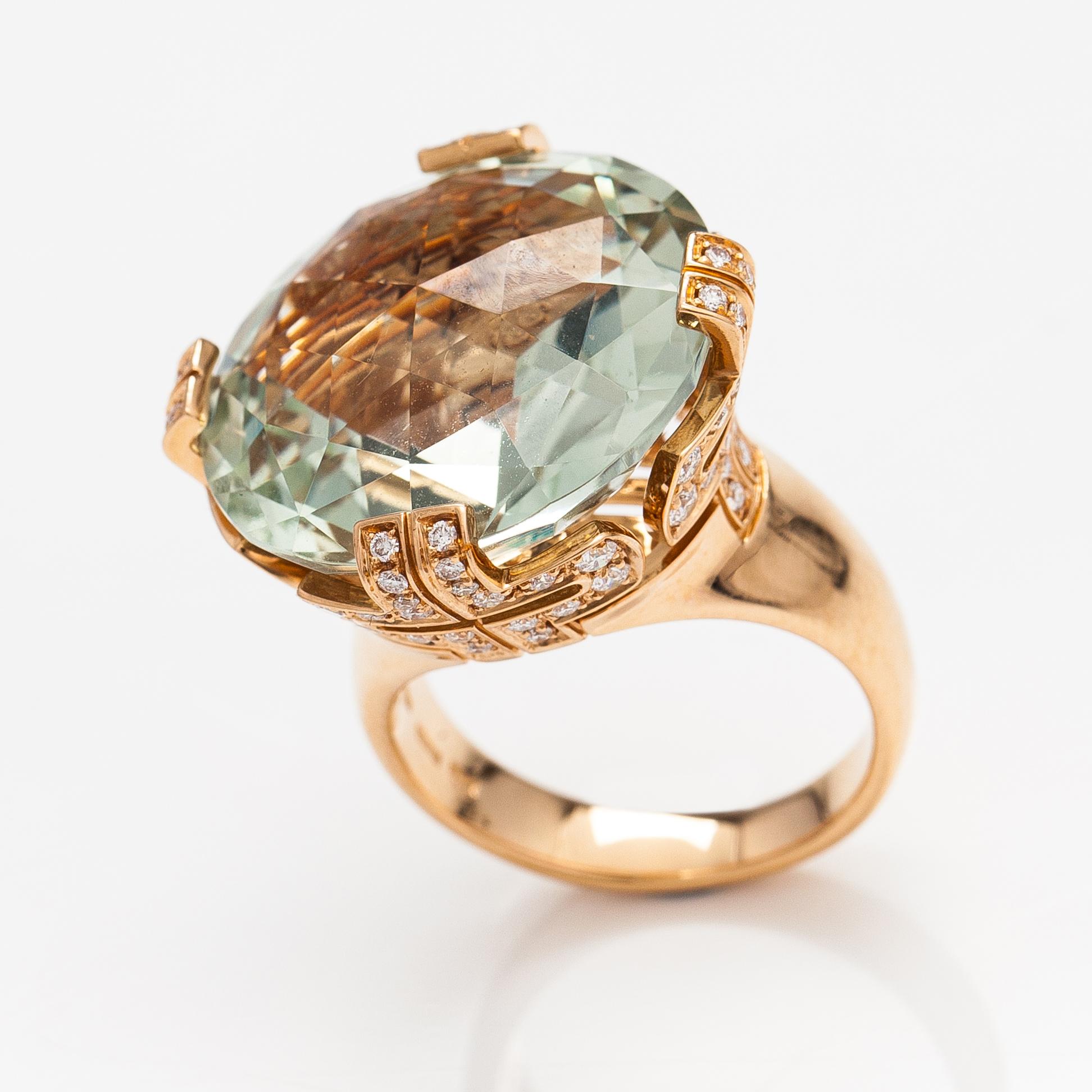 Bulgari, An 18K gold ring "Parentesi" with a green quartz and ca. 0.70 ct of brilliant cut diamonds in total.