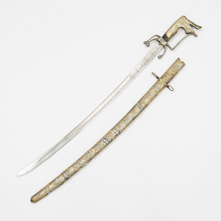 A Spanish sabre with a Nimcha-type hilt with scabbard, 19th Century.