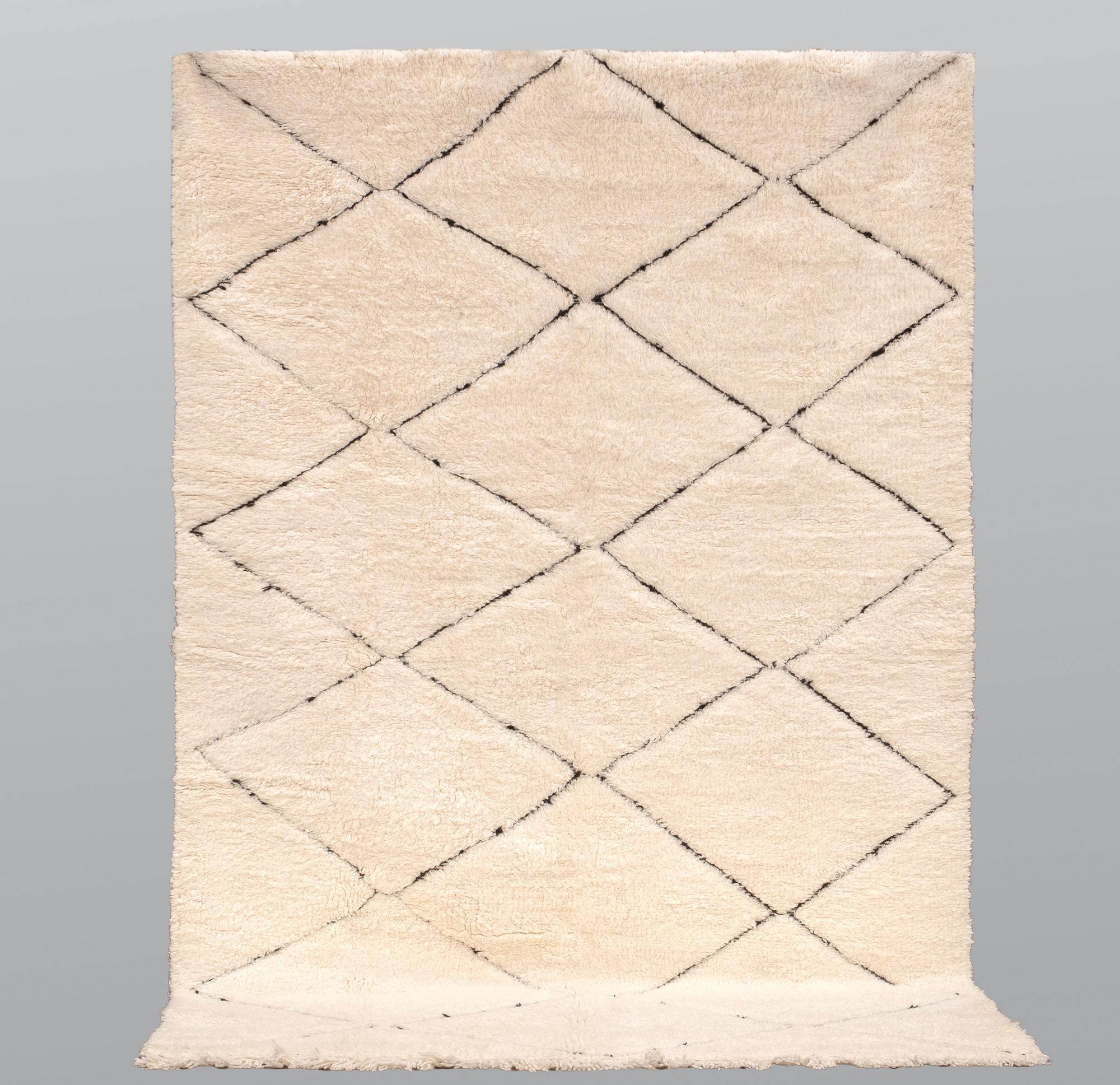 A Moroccan carpet, 247 x 164 cm.