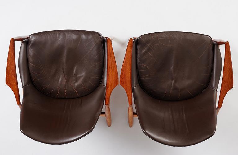 Ib Kofod-Larsen, a pair of "Sälen" dark brown leather chairs, Olof Perssons Fåtöljindustri (OPE), Jönköping.