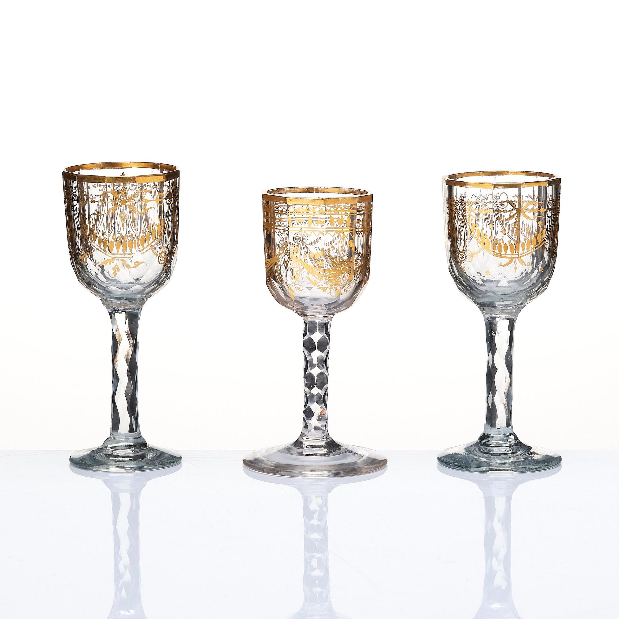 A set of seven cut and gilded glasses, 18th Century.