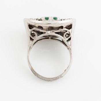Ring, 18K white gold with an emerald-cut emerald and brilliant-cut diamonds.