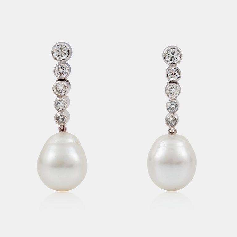 A pair of semi-baroque cultured pearl and brilliant-cut diamond earrings. Total carat weight of diamonds circa 0.70 ct.