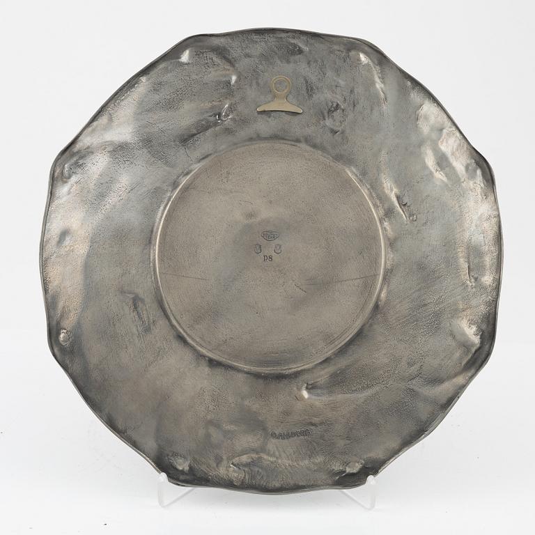 An art noveau pewter charger by Olof Ahlberg, dated 1941.