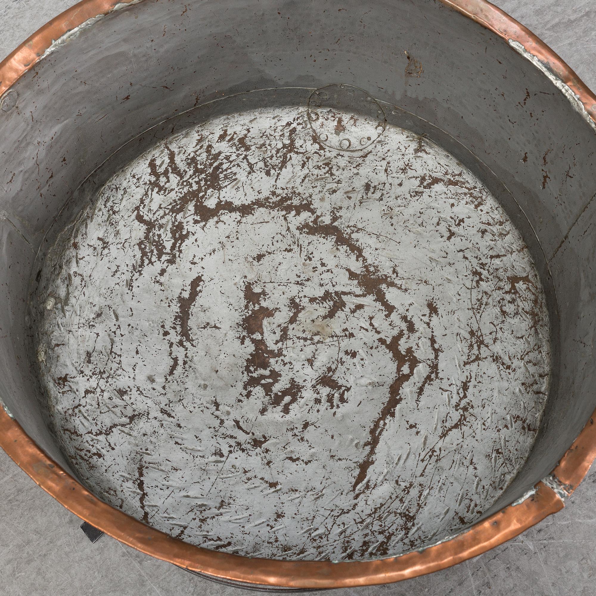 A copper pot, 19th Century.