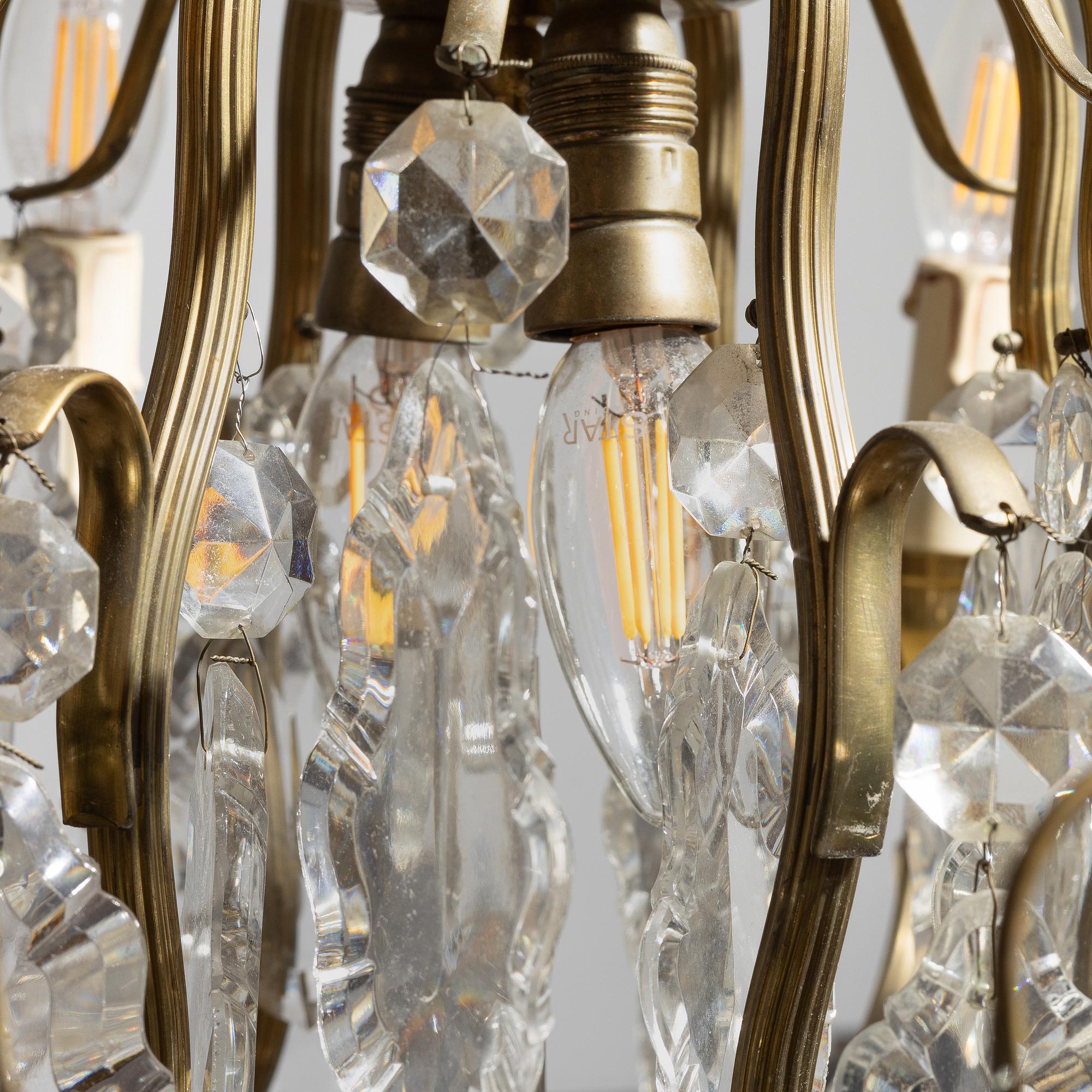 A chandelier, Rococo style, mid-20th century.