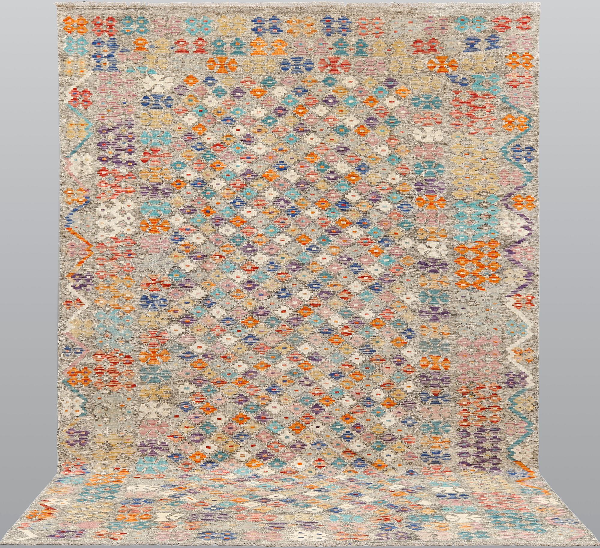 A kilim carpet, ca 290 x 206 cm.