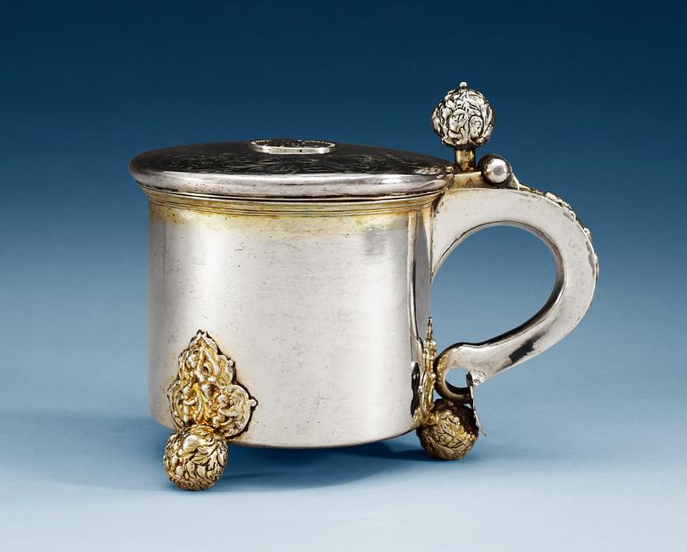 A SWEDISH PARCEL-GILT TANKARD, Makers mark of Johan Nützel, Stockholm (1676-1715) befor 1689.