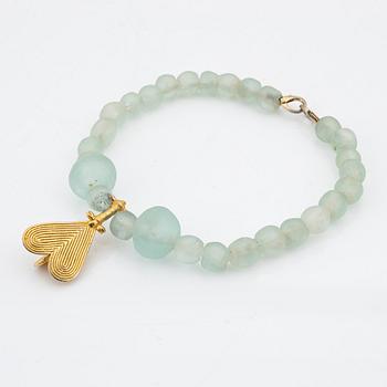 Halsband, inköpt på Firma Svenskt Tenn.