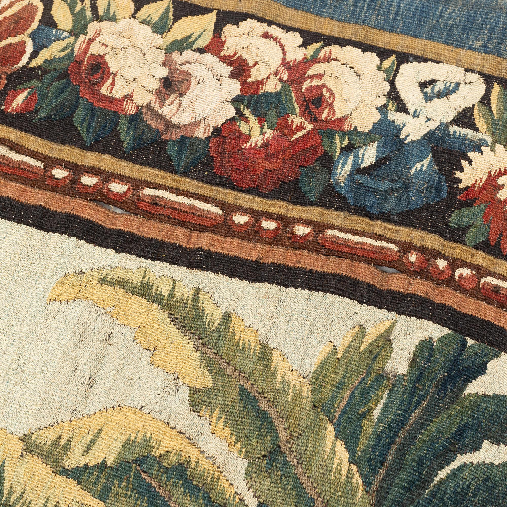 A Manufacture Royale d’Aubusson, 'entre-fenêtre' tapestry, ca 298 x 121-127,5 cm.