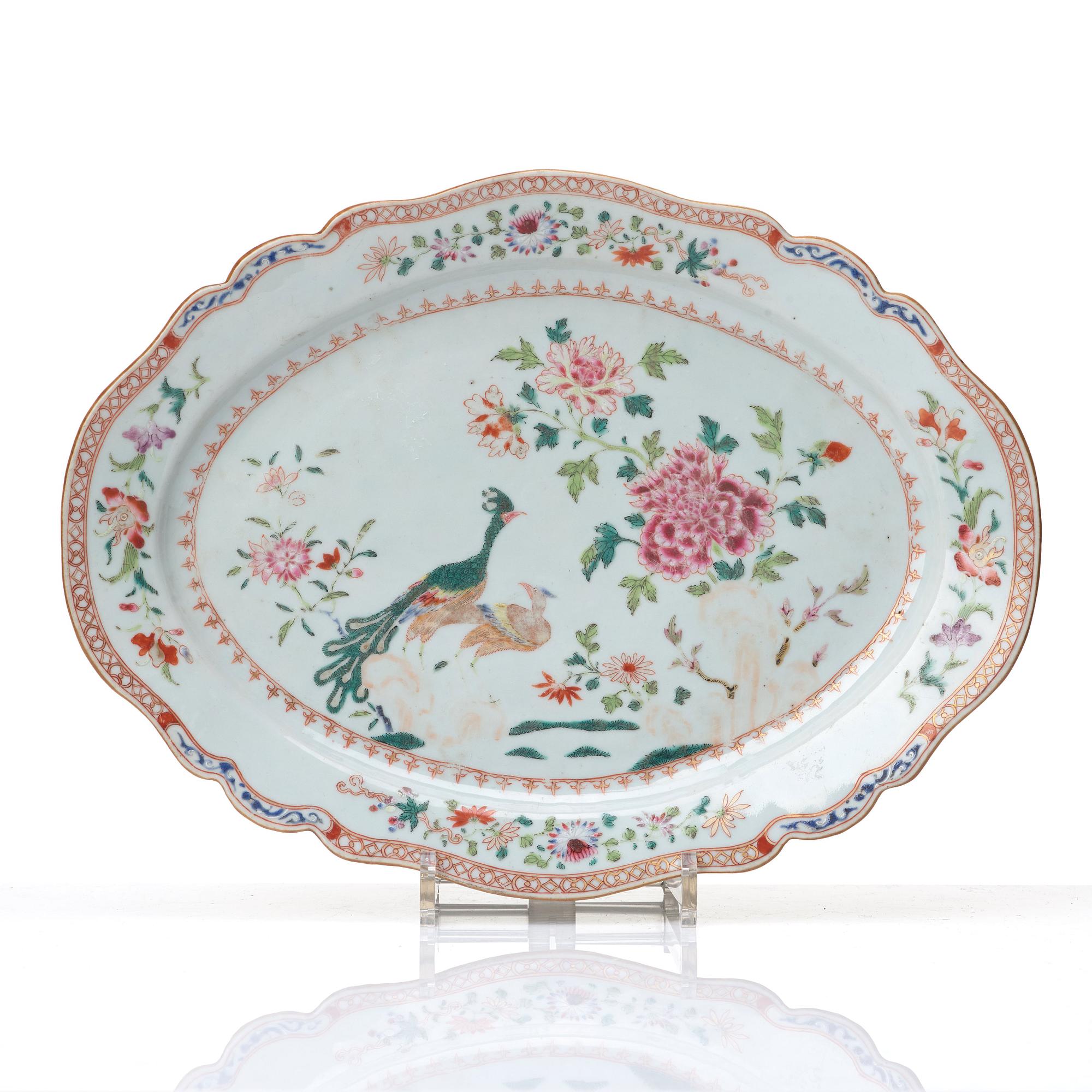A pair of famille rose 'double peacock' serving dishes, Qing dynasty, Qianlong (1736-95).
