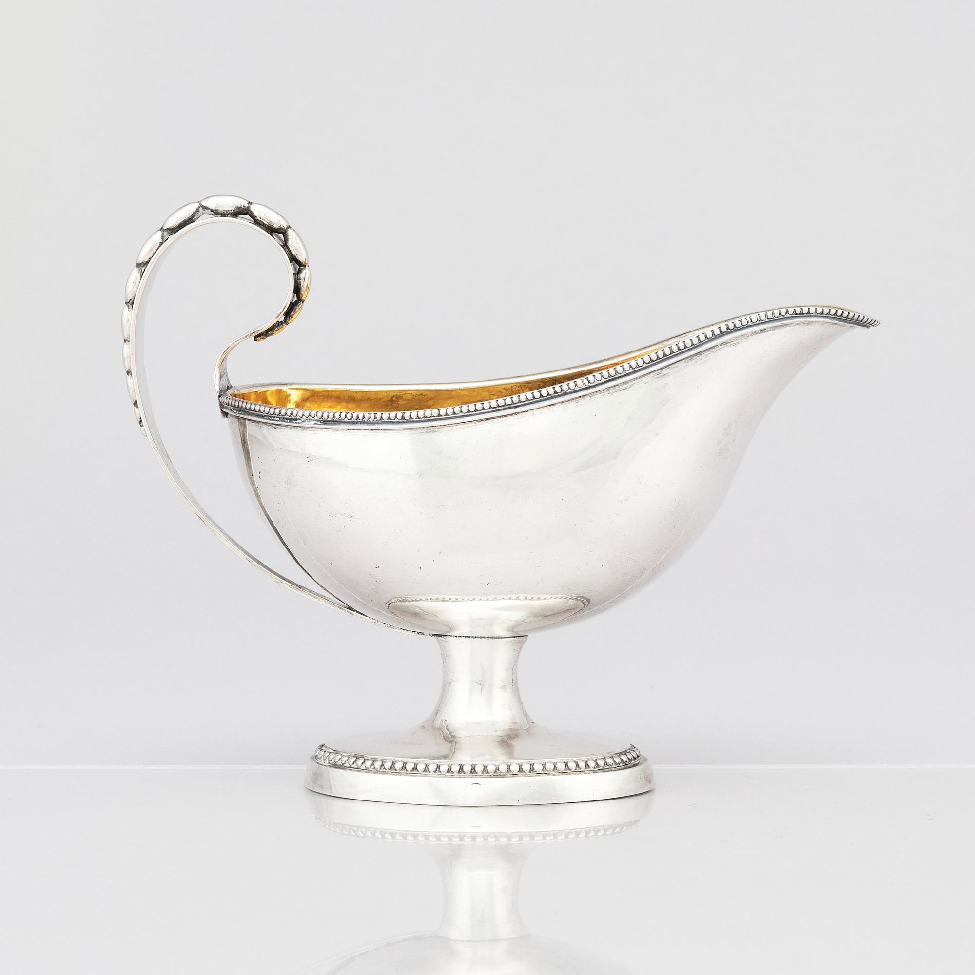 A Swedish Gustavian parcel-gilt silver cream-jug, mark of Pehr Zethelius, Stockholm 1792.