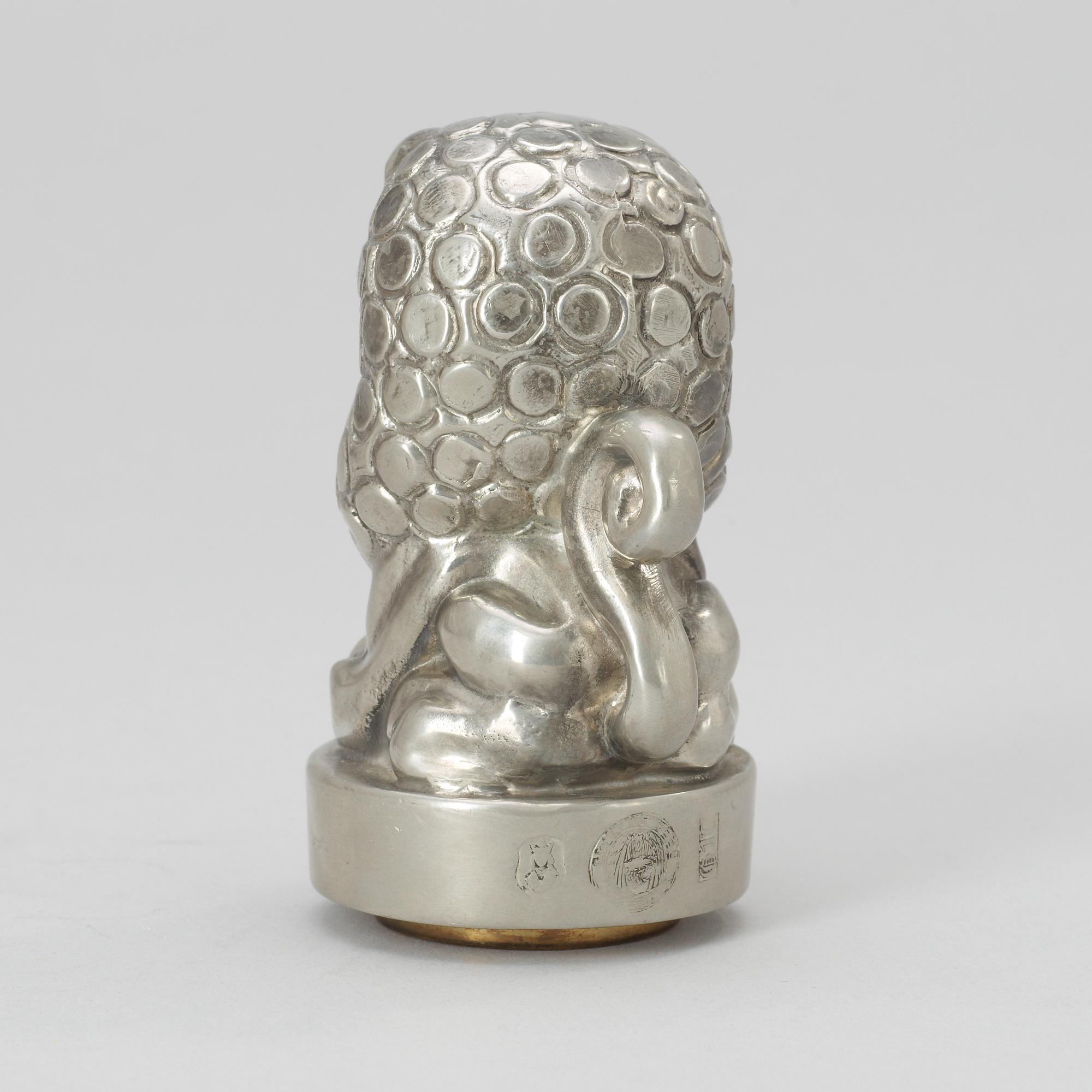 An Anna Petrus pewter and brass seal by Svenskt Tenn 1981.
