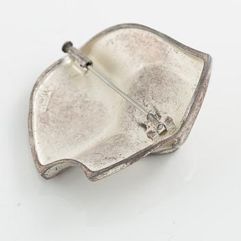 Lapponia a necklace, a pair of earrings and a brooch, sterling silver.