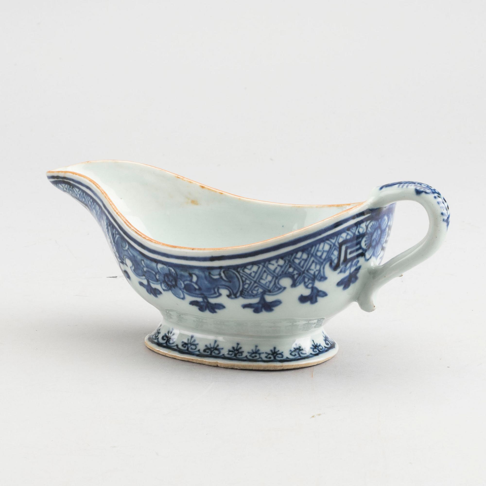 A Chinese porcelain Qianlong serving dish and saucer.