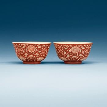 1626. Two coral red ground bowls, late Qing dynasty, with Daoguang and Qianlong mark.