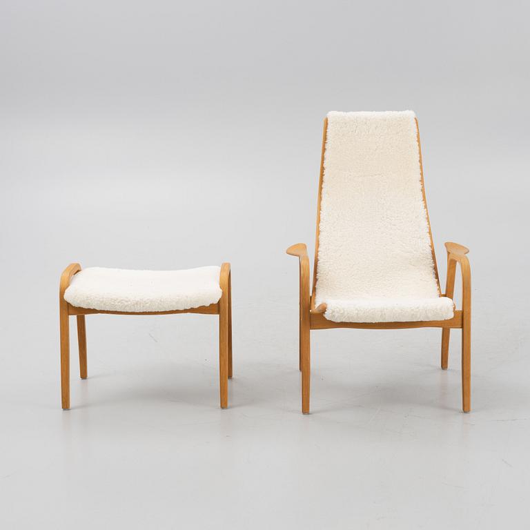 Yngve Ekström, a 'Lamino' armchair and a foot stool, Swedese.