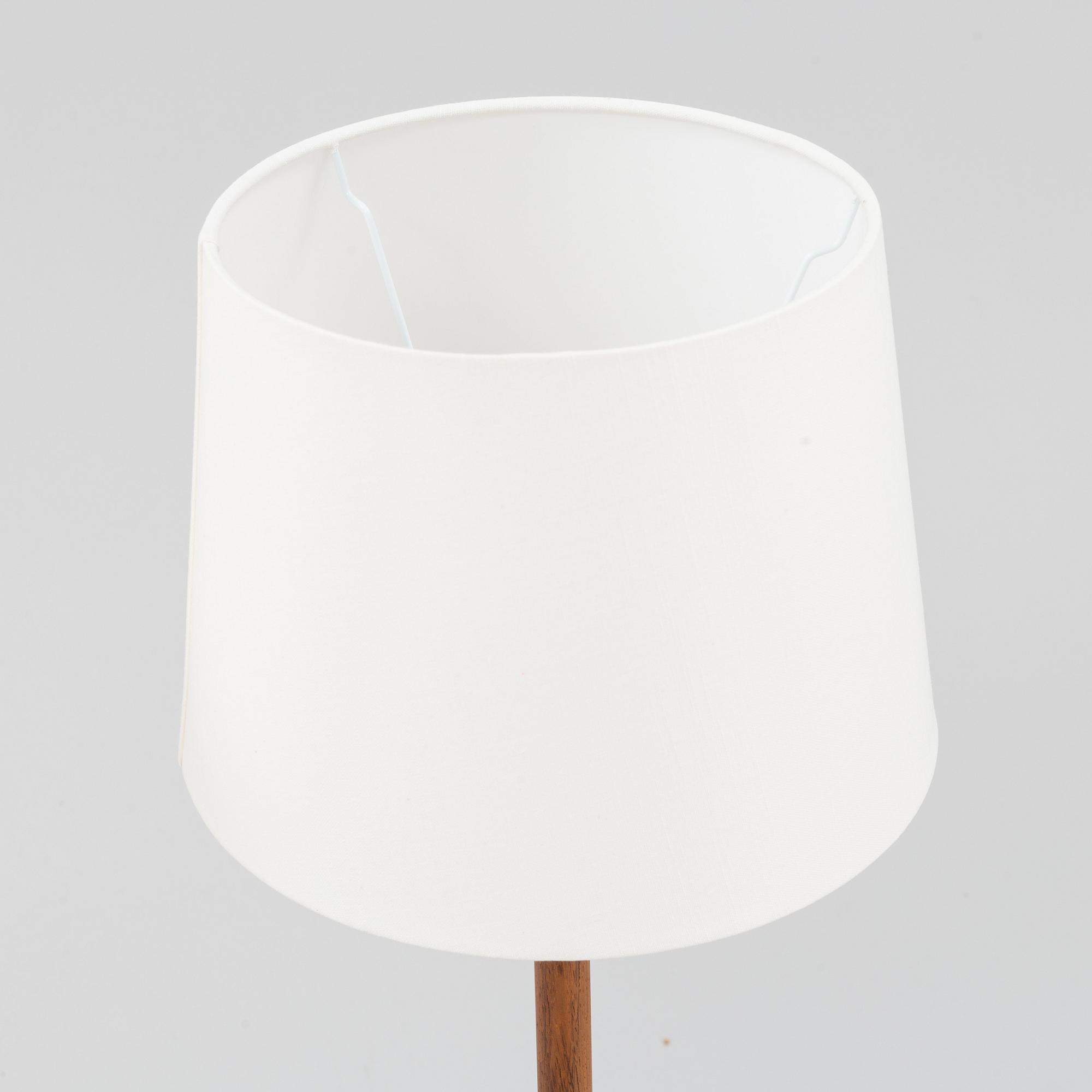 Uno & Östen Kristiansson, a pair of rosewood veneered floor lights, Luxus, Vittsjö, 1960's.