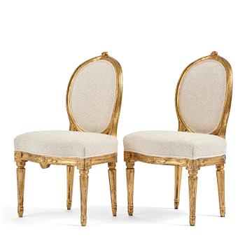 72. A pair of Gustavian giltwood chairs, Stockholm, late 18th century.